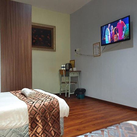 Oyo 90964 Melody 88 Inn Мири Экстерьер фото