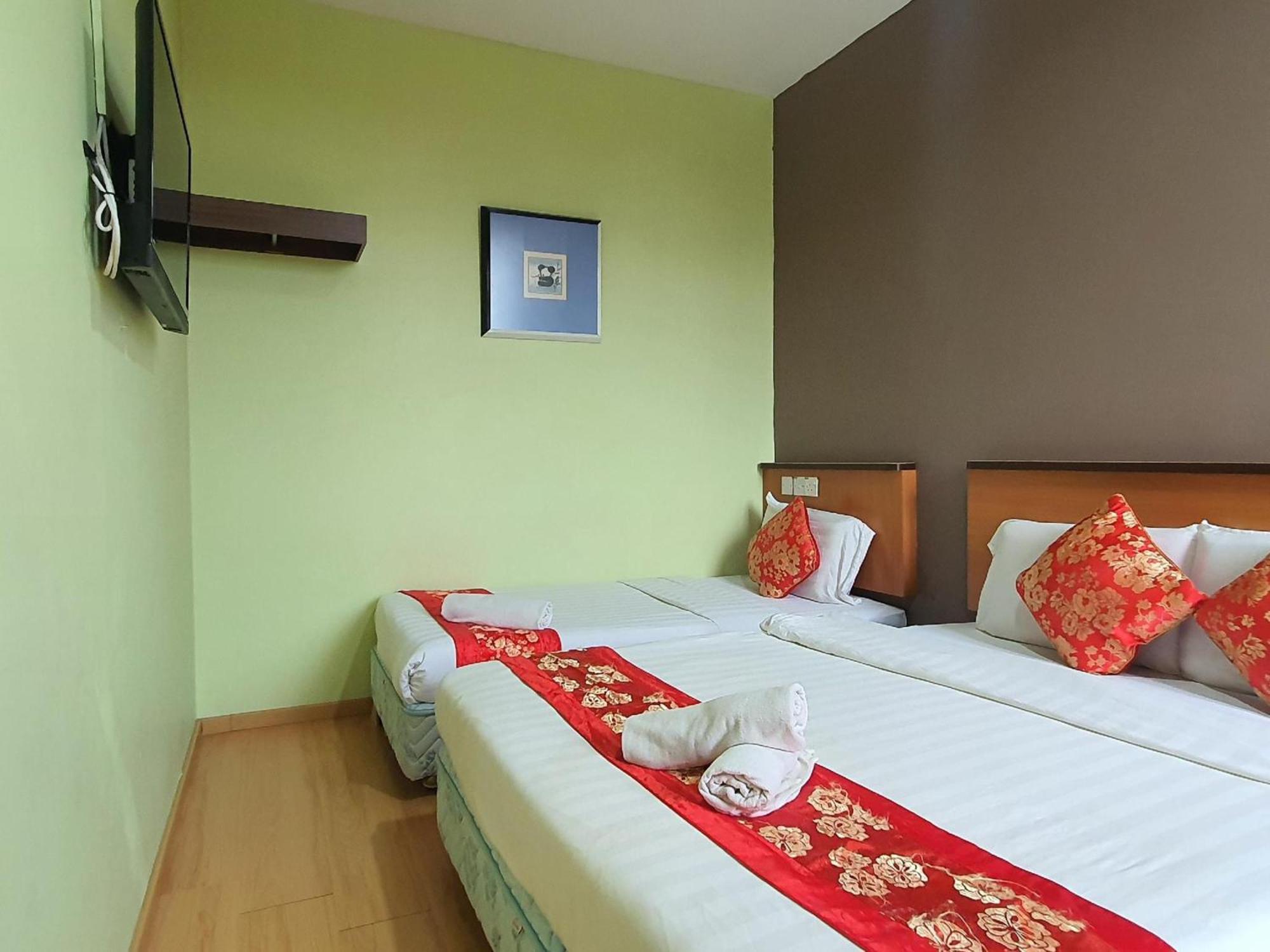 Oyo 90964 Melody 88 Inn Мири Экстерьер фото
