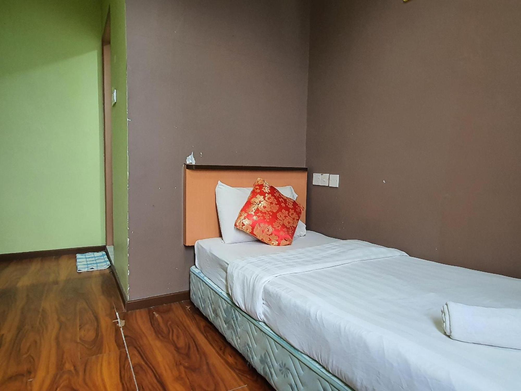 Oyo 90964 Melody 88 Inn Мири Экстерьер фото