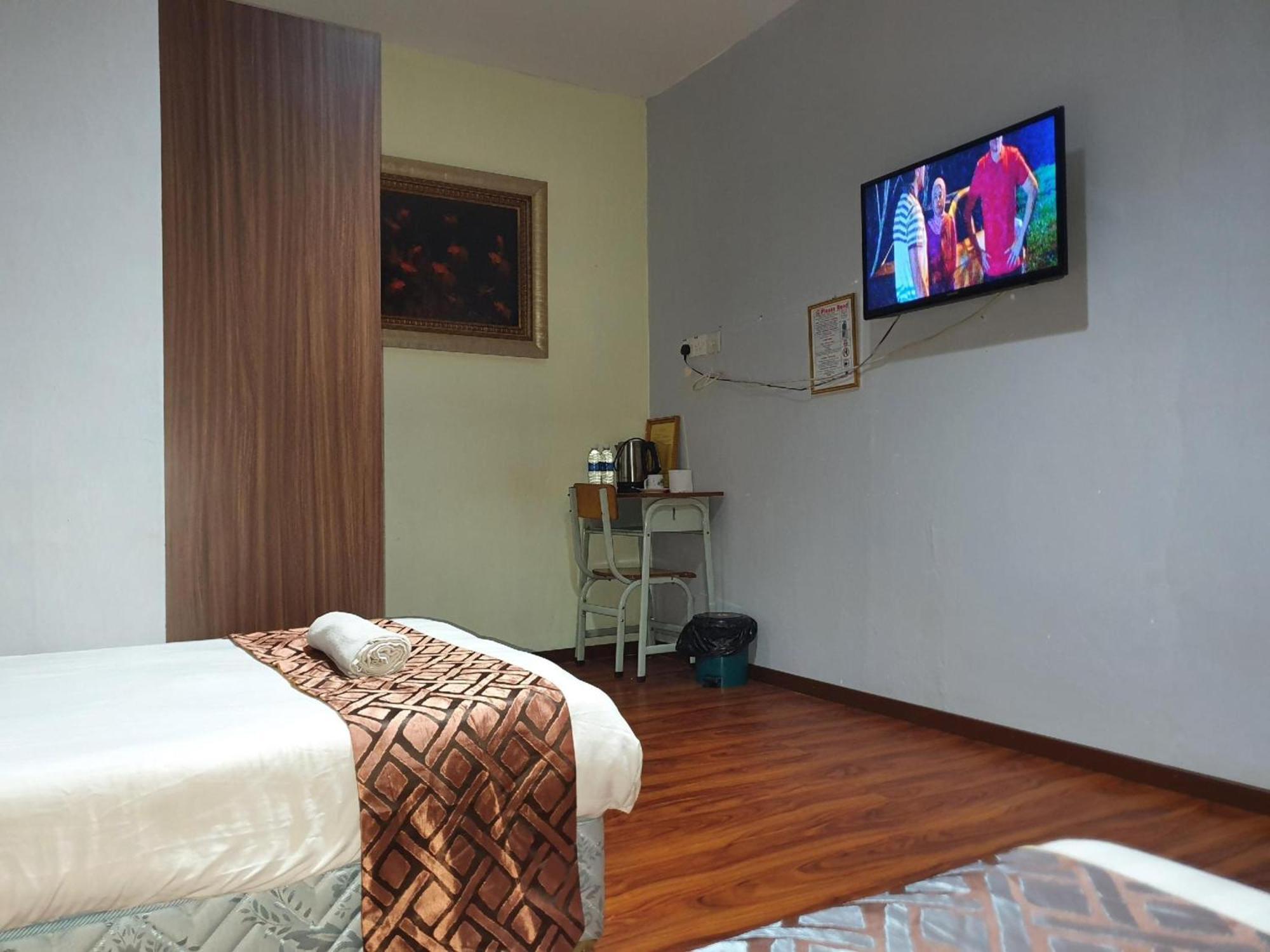 Oyo 90964 Melody 88 Inn Мири Экстерьер фото