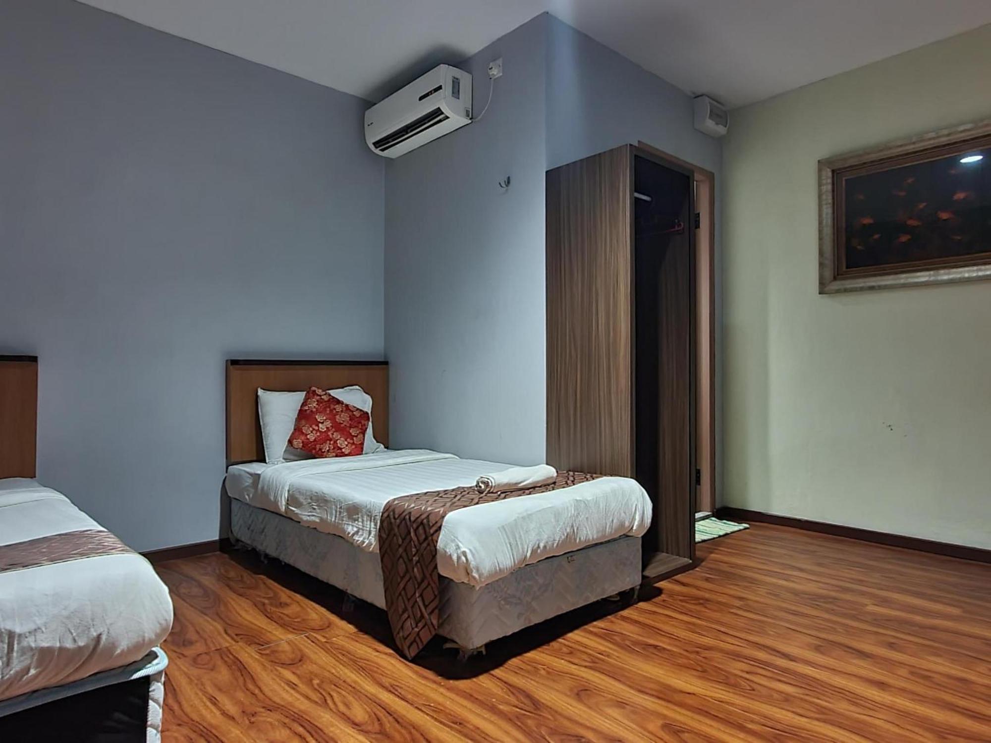 Oyo 90964 Melody 88 Inn Мири Экстерьер фото