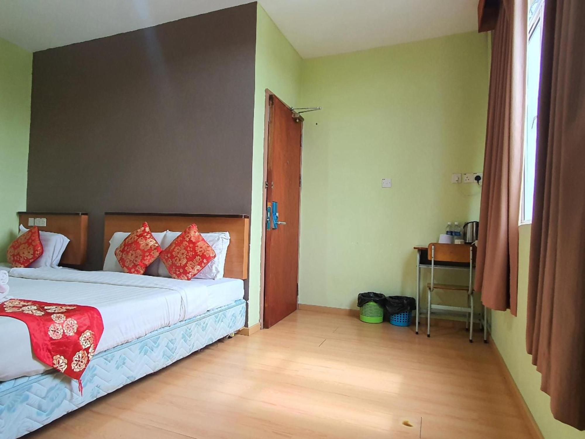 Oyo 90964 Melody 88 Inn Мири Экстерьер фото